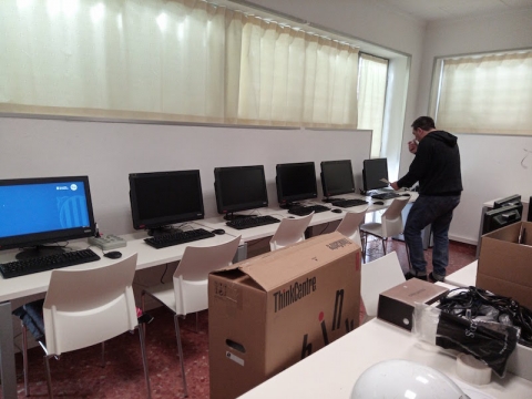 Technician installing new hardware during the pilot test